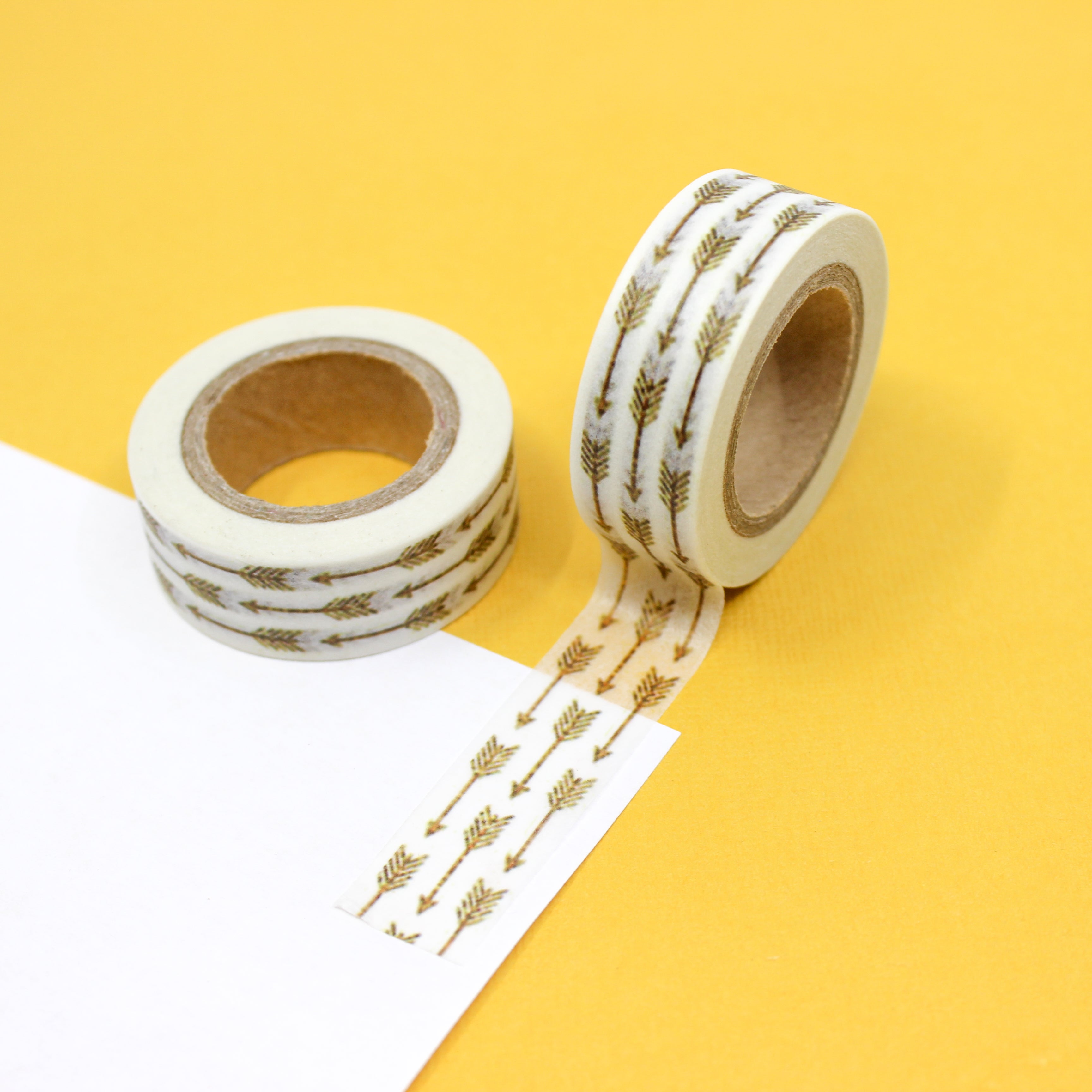 This is a gold multi-arrows washi tape from BBB Supplies Craft Shop