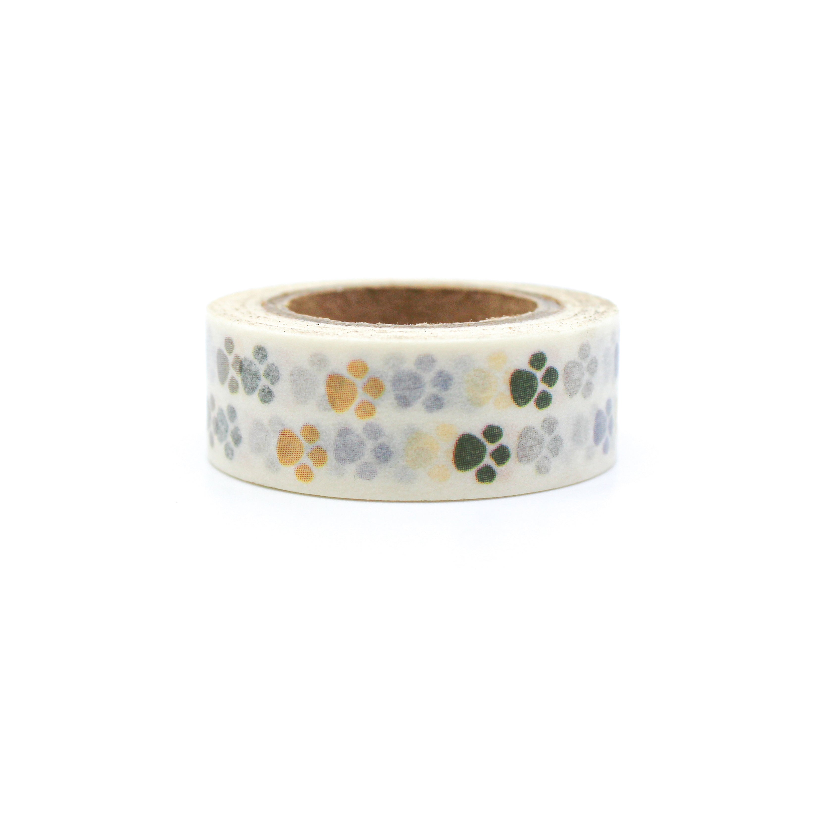 This is a grey, black and yellow animal paw prints washi tapes from BBB Supplies Craft Shop