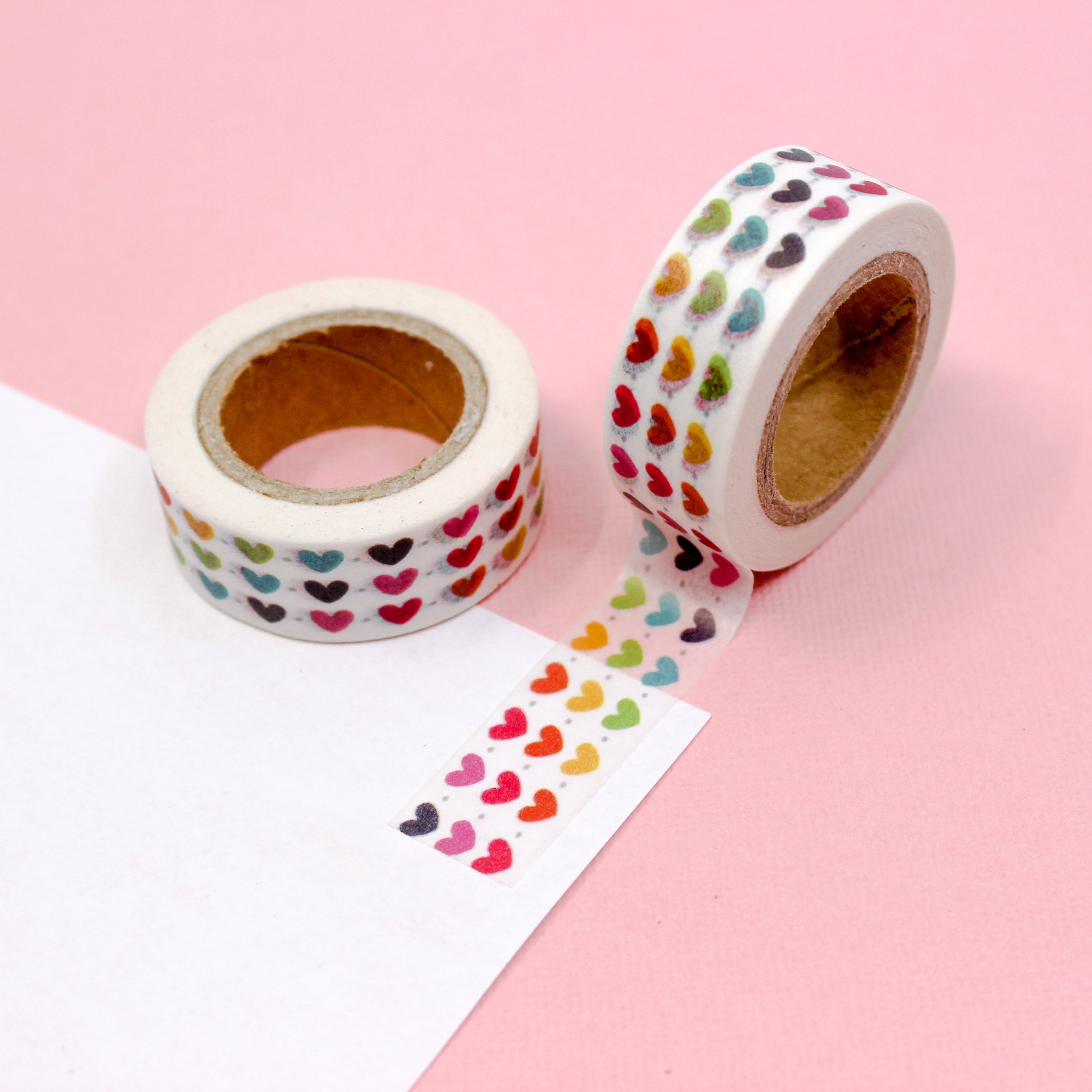 This is a gradient color of multi stacked tiny hearts view themed washi tape from BBB Supplies Craft Shop
