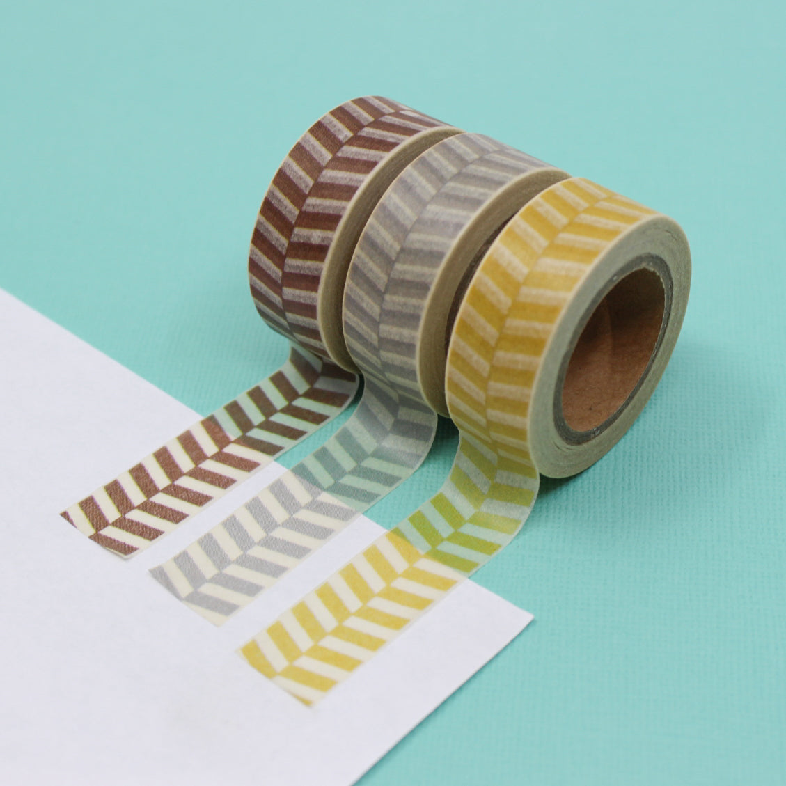 This fun and unique chevron pattern resembles a zipper. It will make a super cute addition to your washi collection. We sell this style of chevron tape in Yellow, brown and grey in our shop. This tape is sold at BBB Supplies Craft Shop.